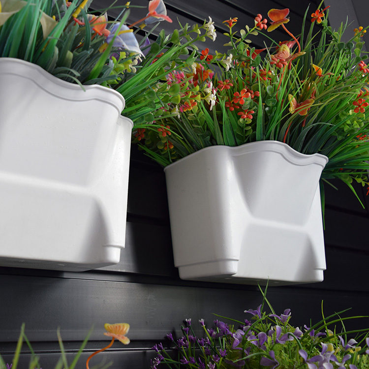 Pots de fleurs verticaux en plastique fixés au mur de planteur de jardin accrochant